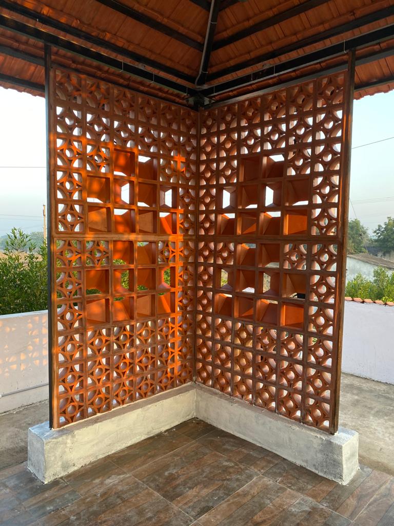 terracotta-clay-jali-partition-wall-cladding-facade-in-hyderabad-surya walll texture
